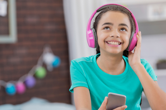 Girl listening to music. How fidget spinner rings empower girls