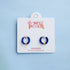 Royal blue hoop earrings on a &