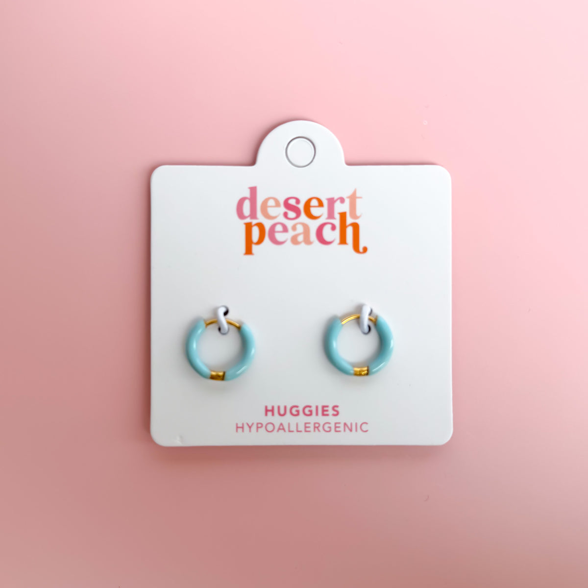 Light blue huggie hoop earrings