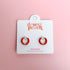 Red huggie hoop earrings