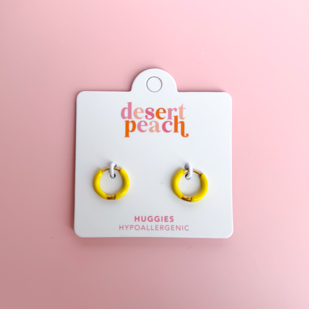Yellow huggie hoop earrings
