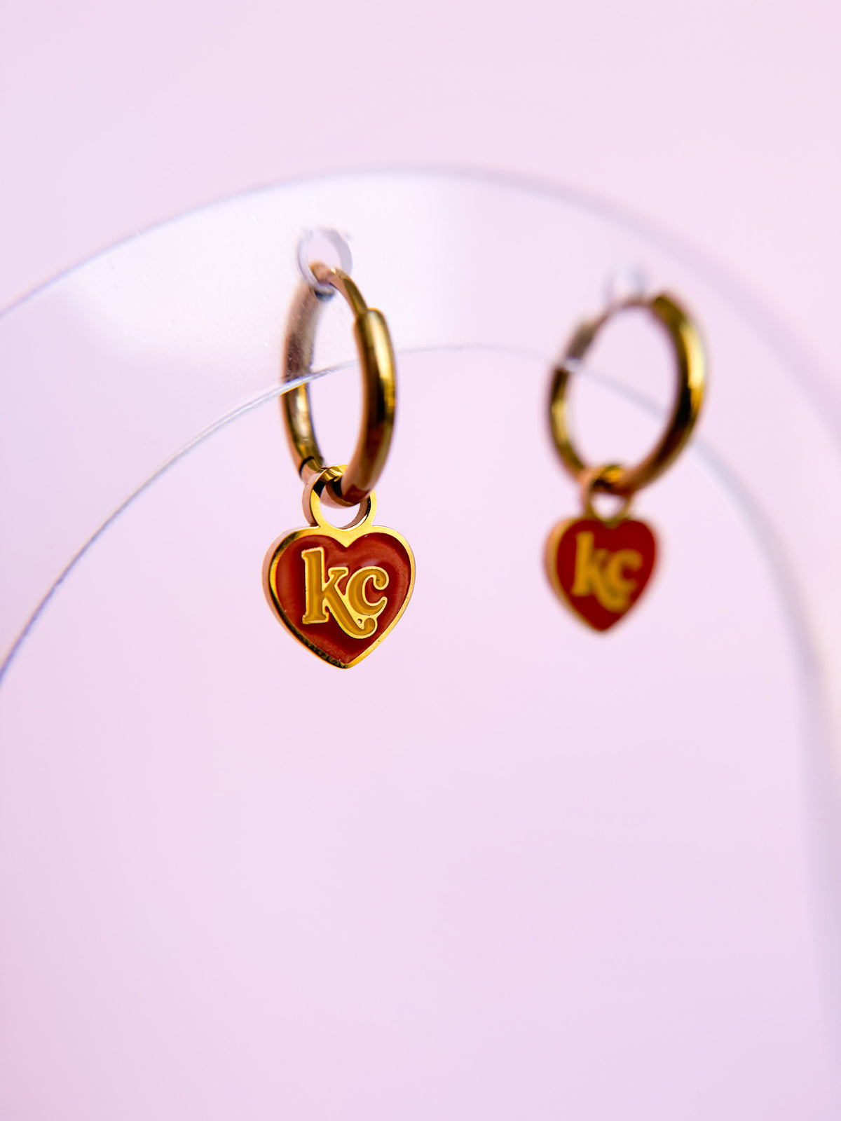 KC heart huggie charms close-up