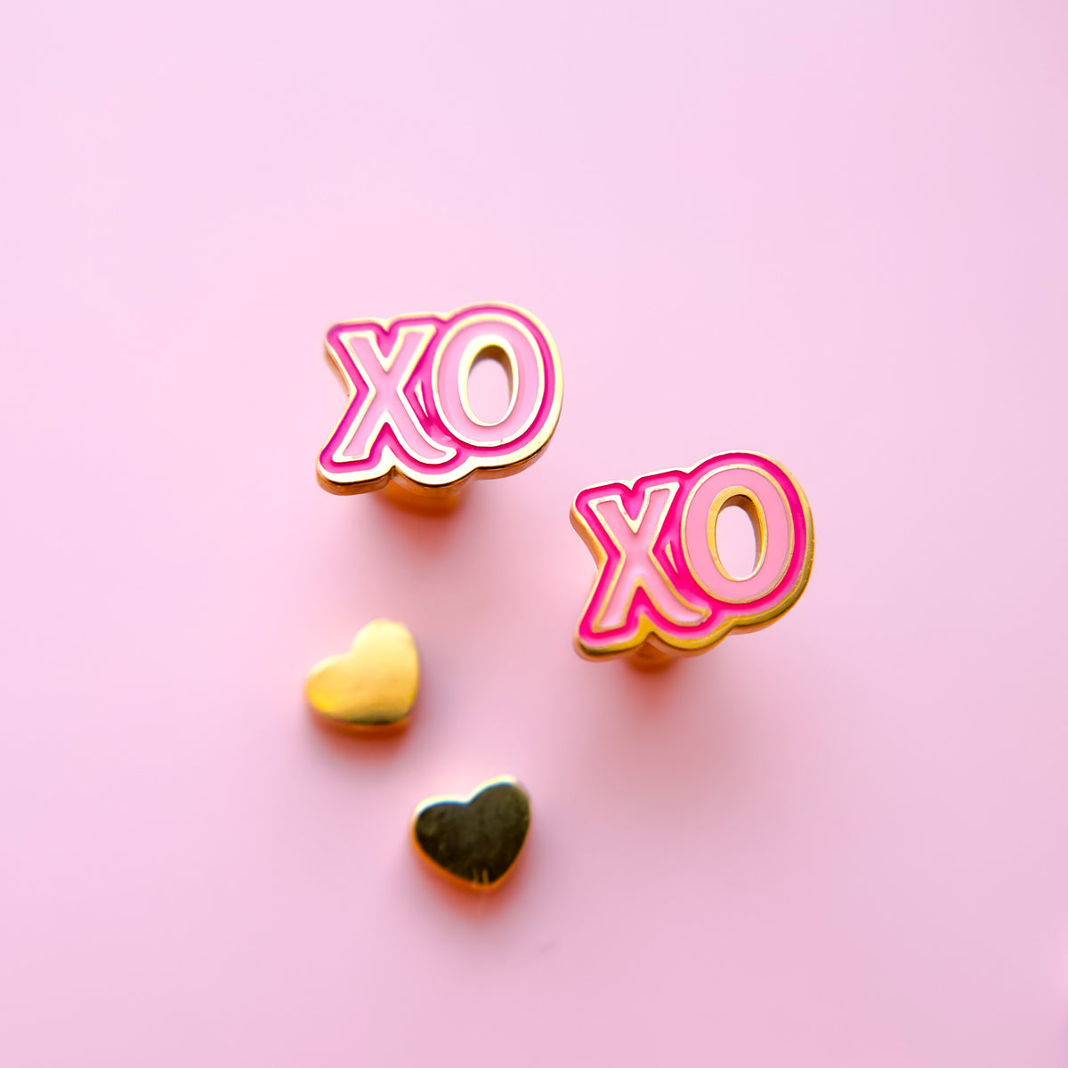 Pair of XOXO stud earrings
