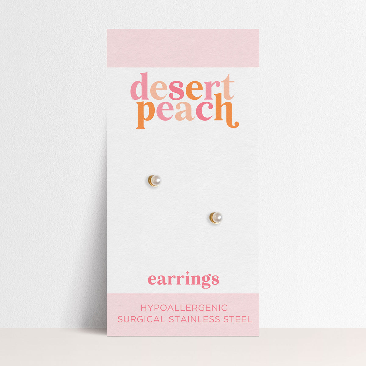 Tiny pearl stud earrings mockup