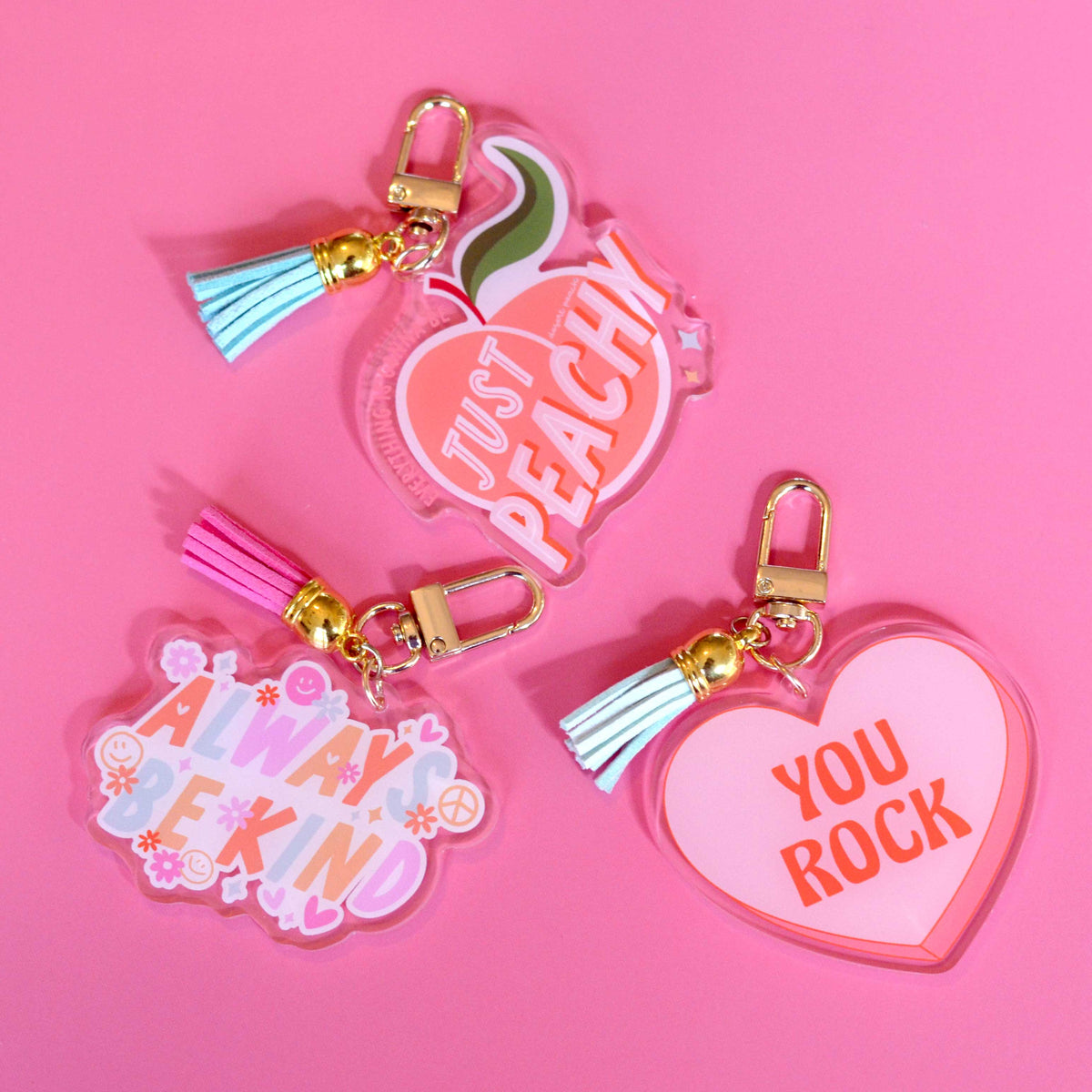 Set of You Rock acrylic keychains