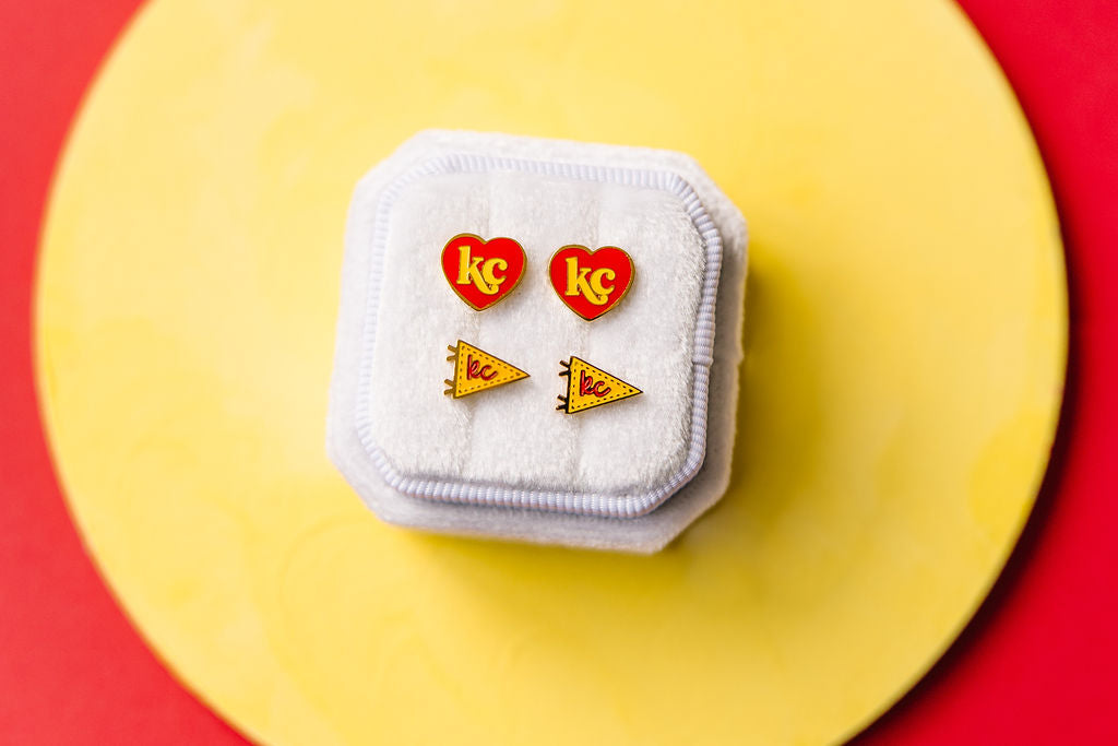 Kansas City Chiefs stud earrings in a jewelry box