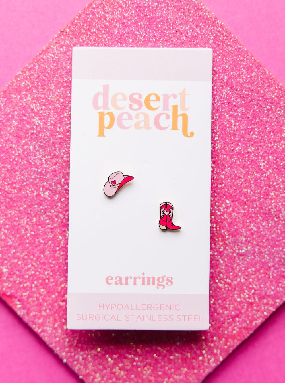 Pink glitter disco cowgirl stud earrings
