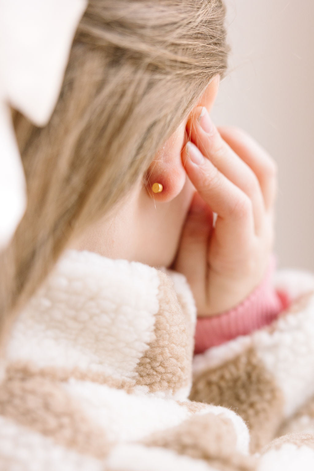 Flat back stud earrings showing the screw-on backs