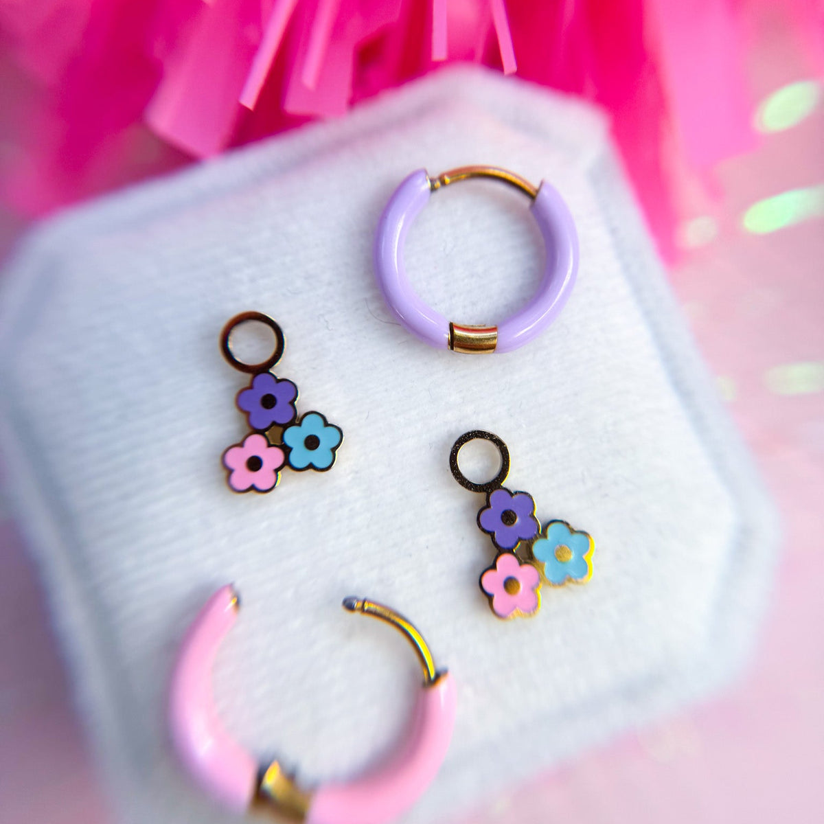 Flower power huggie charms on huggie hoops