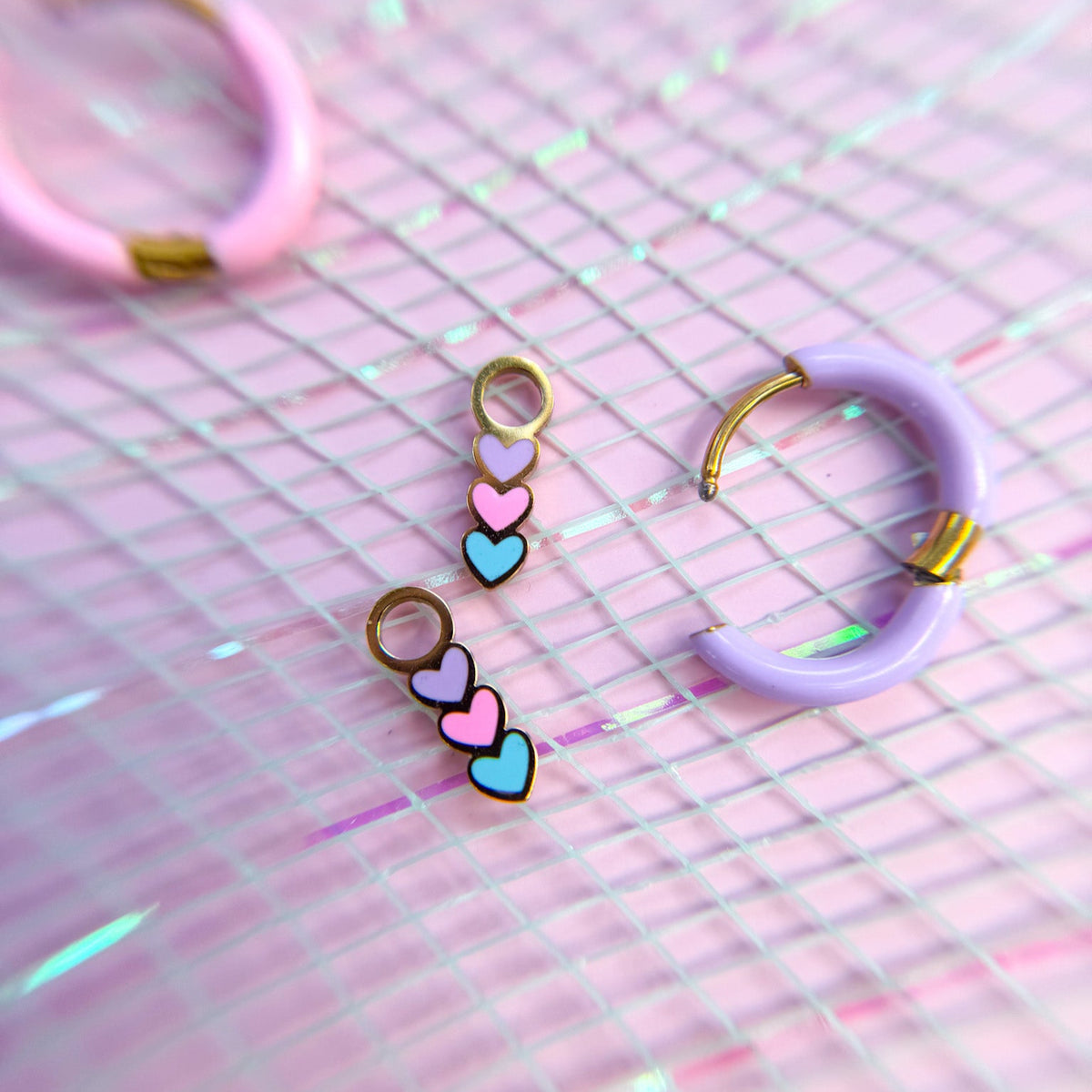 Heart huggie charms on huggie hoops