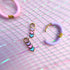 Heart huggie charms on huggie hoops