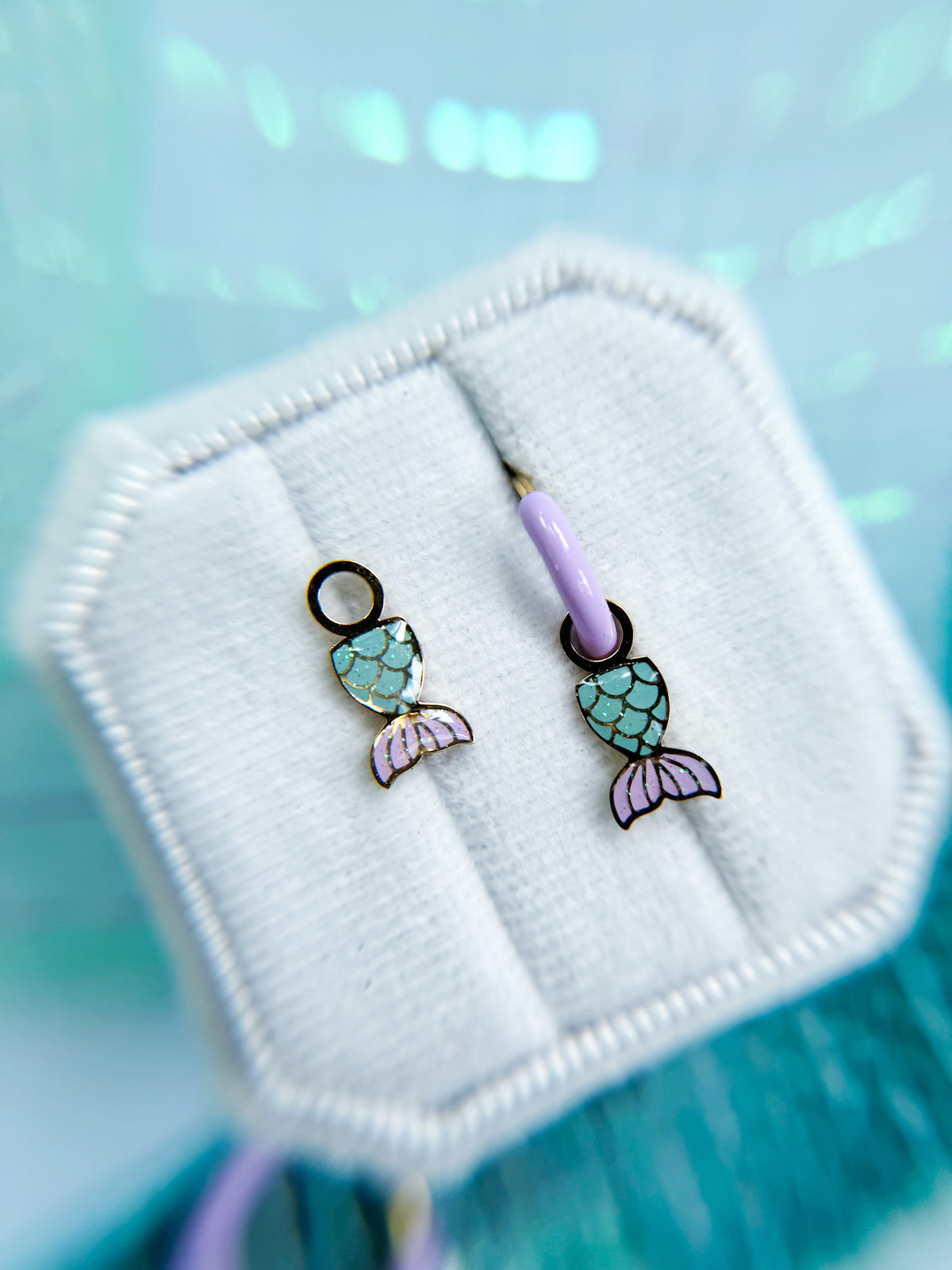 Mermaid tail huggie charms close-up
