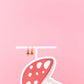 Mushroom-shaped earrings on a pink background
