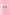 Set of light pink bow charms on gold huggie charms hanging on a white jewelry stand against a light pink background