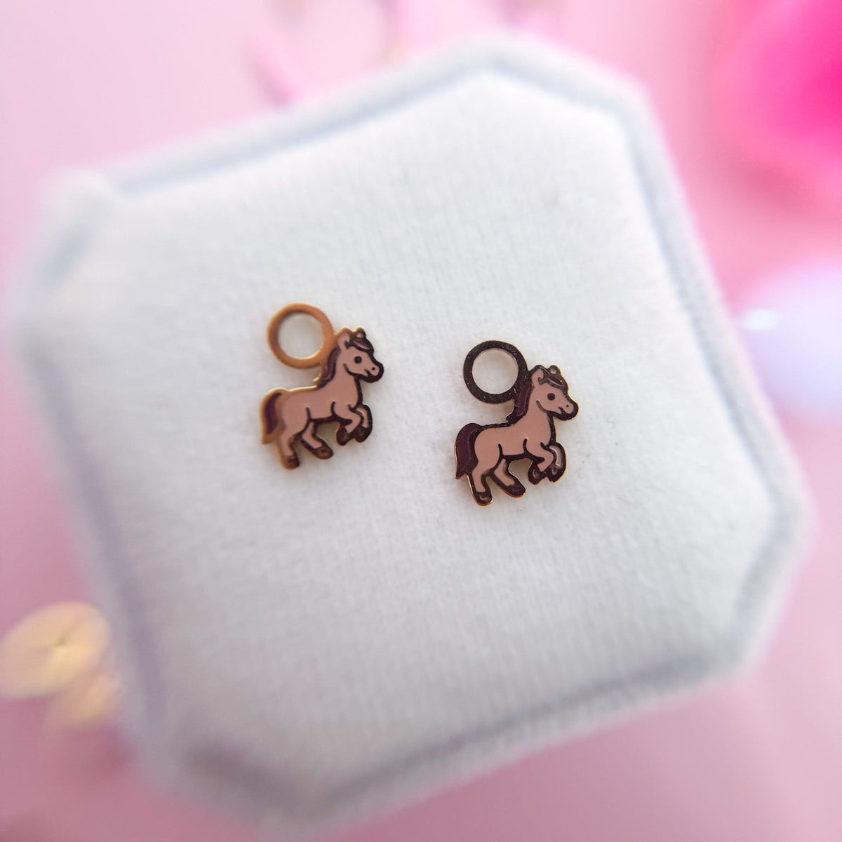 Pony huggie charms on huggie hoops