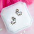 Rainbow unicorn huggie charms on huggie hoops