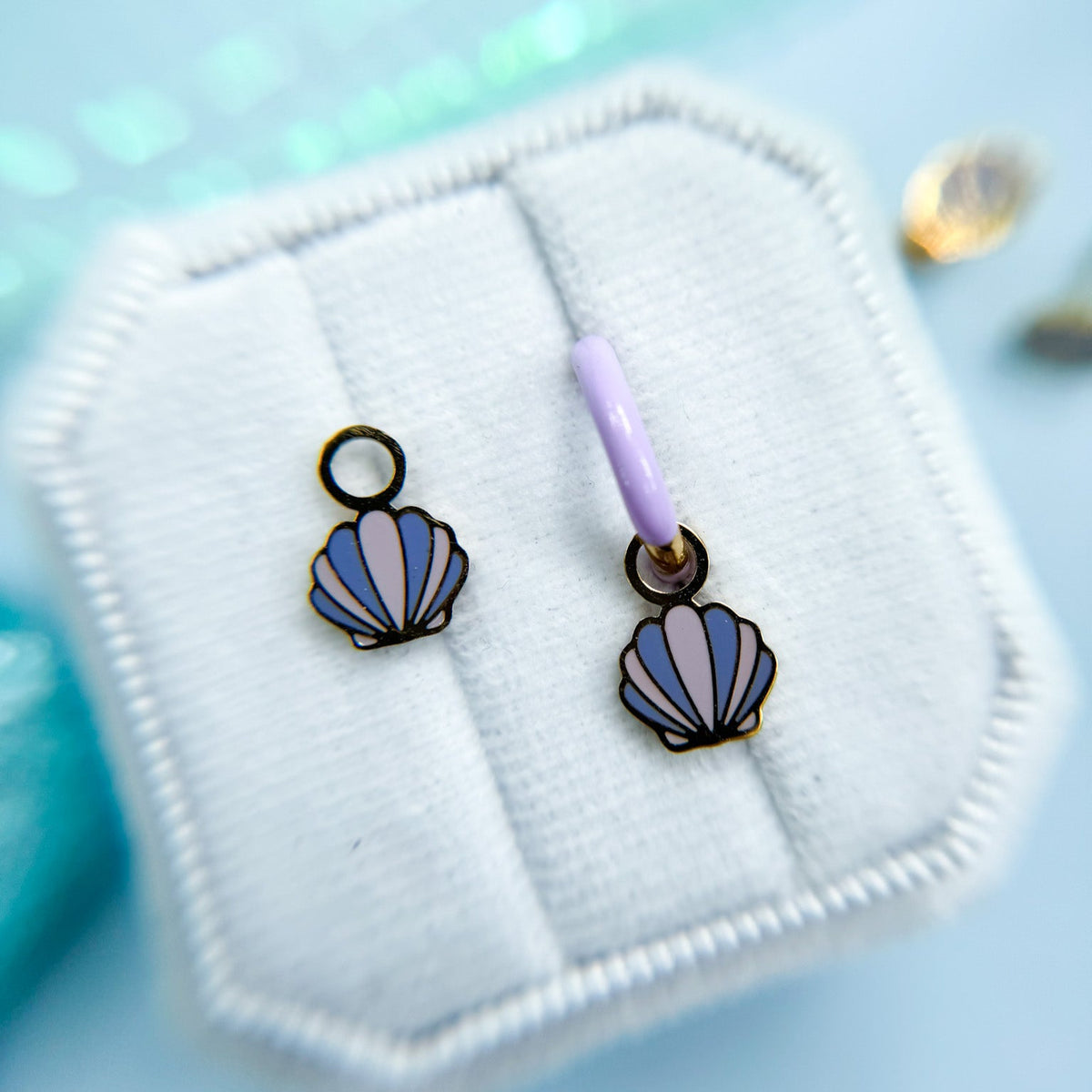 Seashell huggie charms on huggie hoops