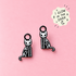 Skeleton kitty huggie charms glowing in the dark