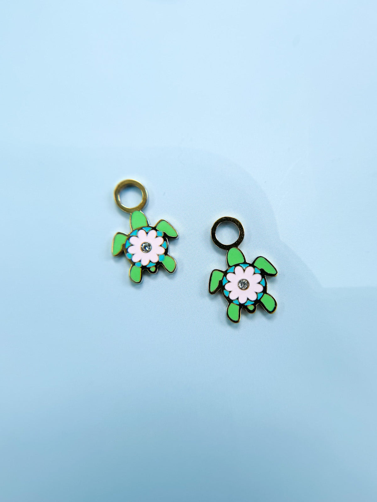 Sea turtle huggie charms close-up