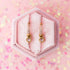 Pink heart gemstone huggie charms on huggie hoops
