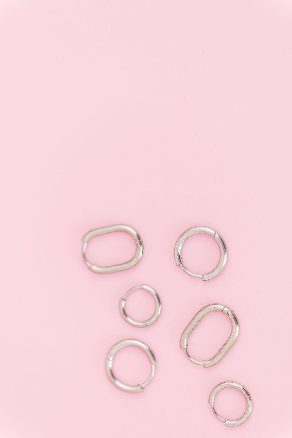 Silver Oval Huggie Hoops