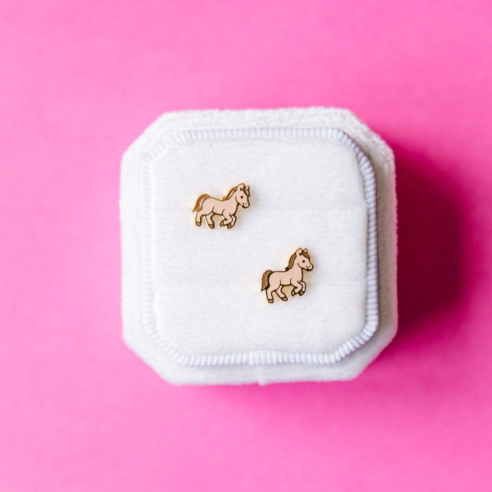 Pair of pony stud earrings
