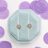 Pair of lavender enamel daisy stud earrings in gold-tone hypoallergenic stainless steel