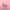 Two candy apple-shaped flat back stud earrings on a pink background