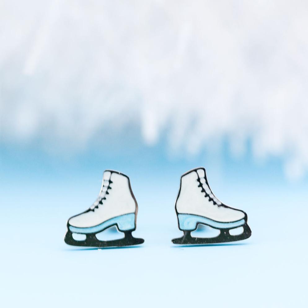 Ice skate stud earrings close-up
