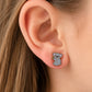 Koala studs on a girl's ear 
