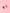Two milk carton shaped stud earrings. One chocolate, one strawberry on a light pink background