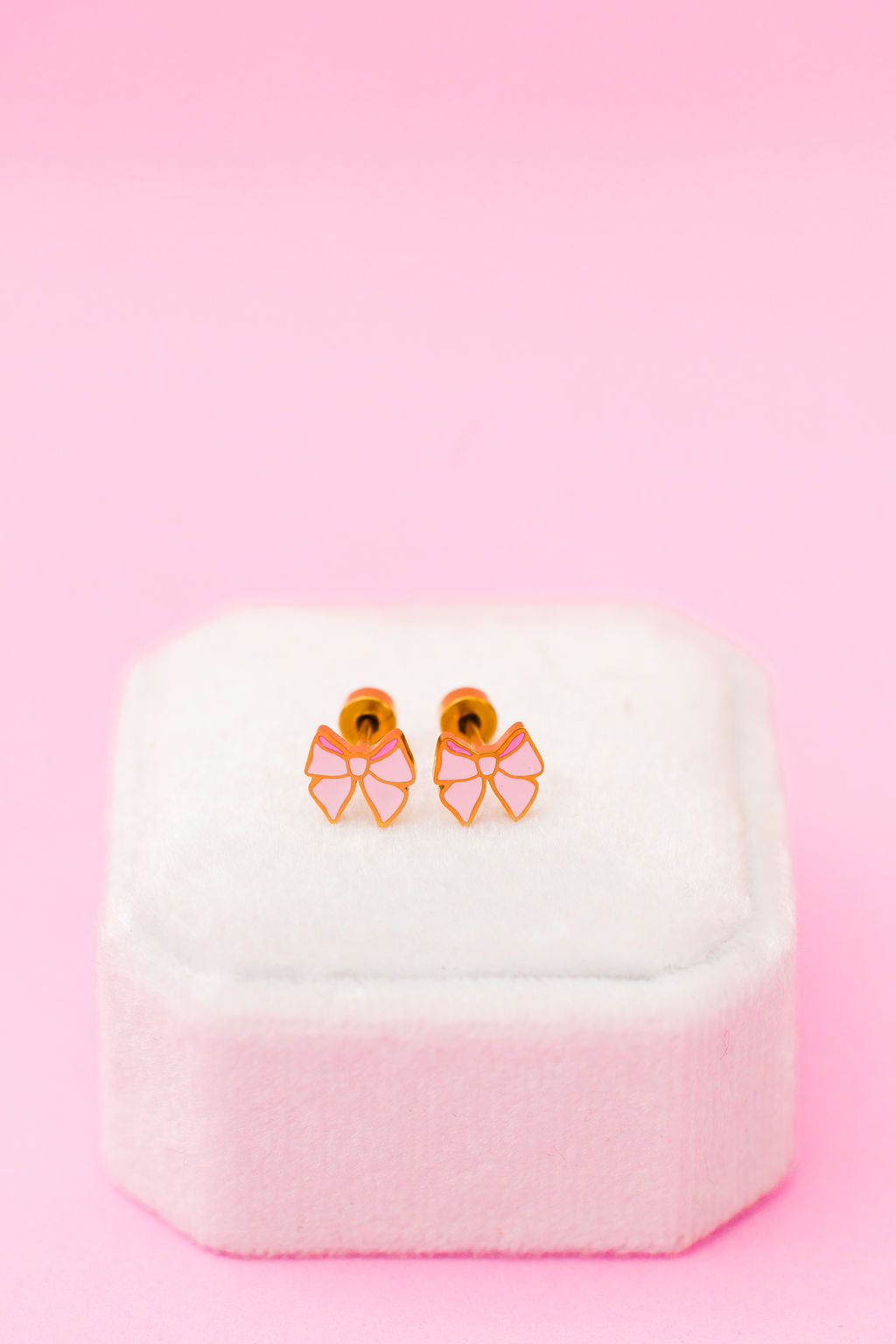 Pink bow stud earrings, alternate view