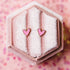 Pair of pink heart stud earrings