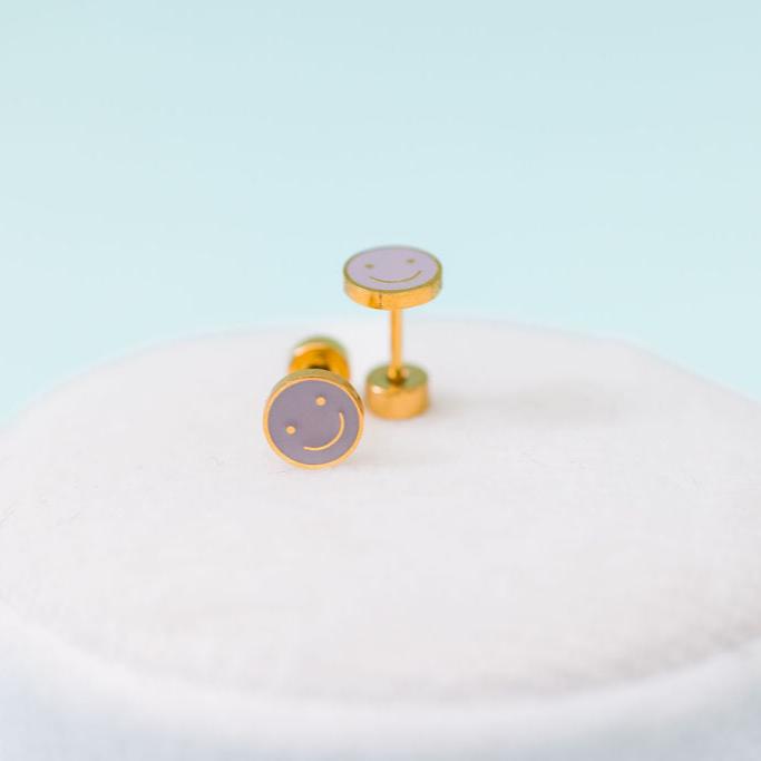 Pair of lavender smiley face stud earrings