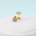 Pair of lavender smiley face stud earrings