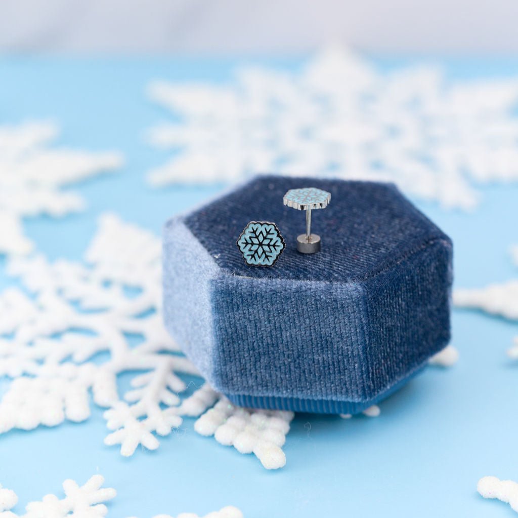 Snowflake stud earrings close-up