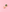 A gold-tone stud earring with an enamel book pin featuring a crescent moon and the word 'SPELLS' on a pink background.