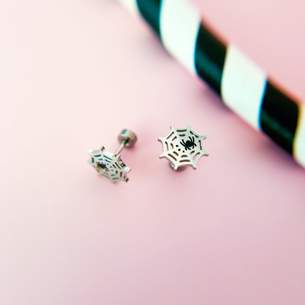 Pair of spiderweb stud earrings