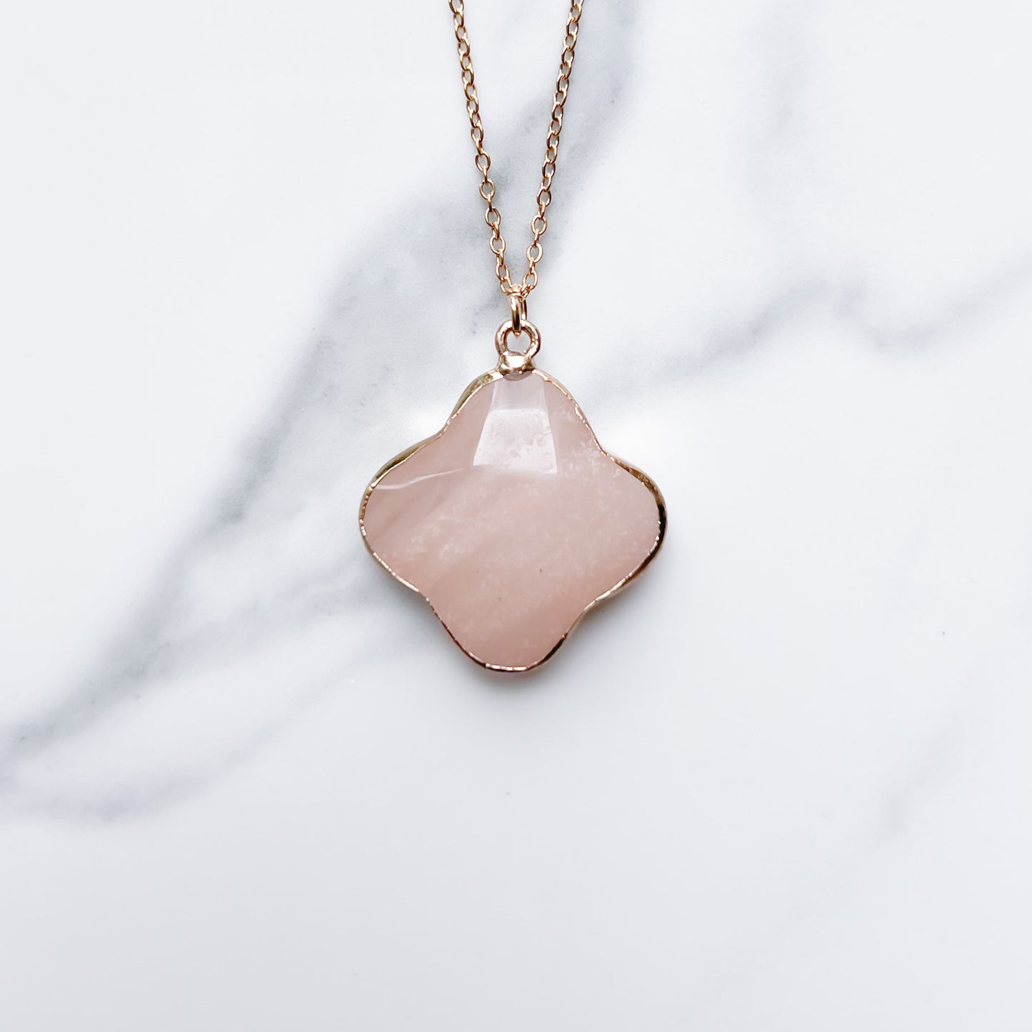 Semi precious healing gemstone clover shaped pendant necklace in pink adventurine