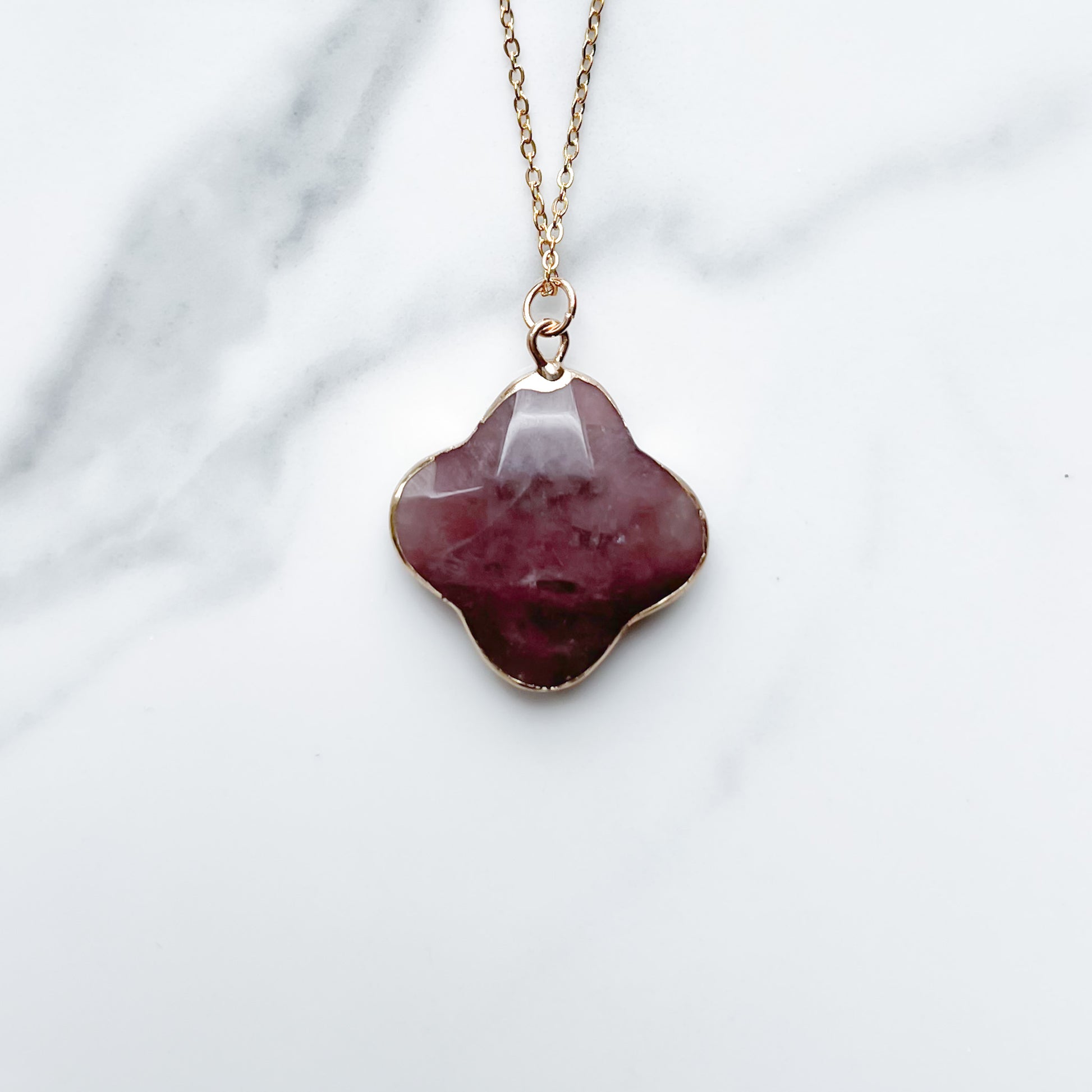 Semi precious healing gemstone clover shaped pendant necklace in strawberry quartz
